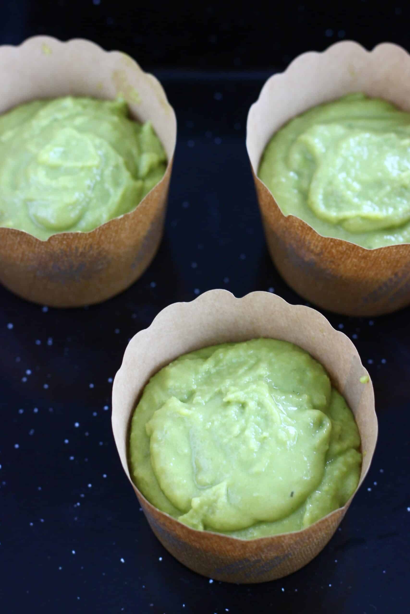 Raw gluten-free vegan matcha muffins batter in muffin cases