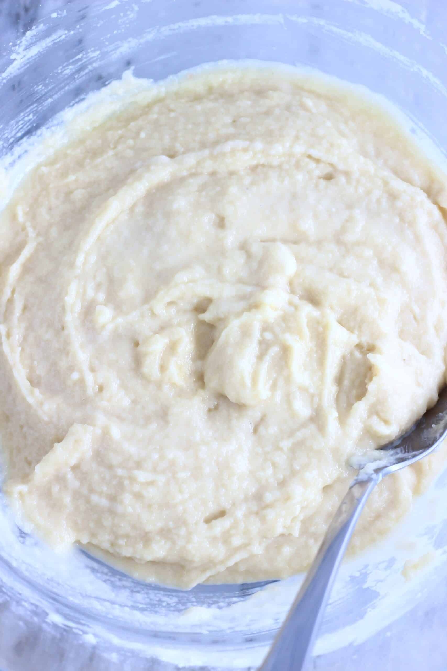 Raw gluten-free vegan almond loaf cake batter in a mixing bowl