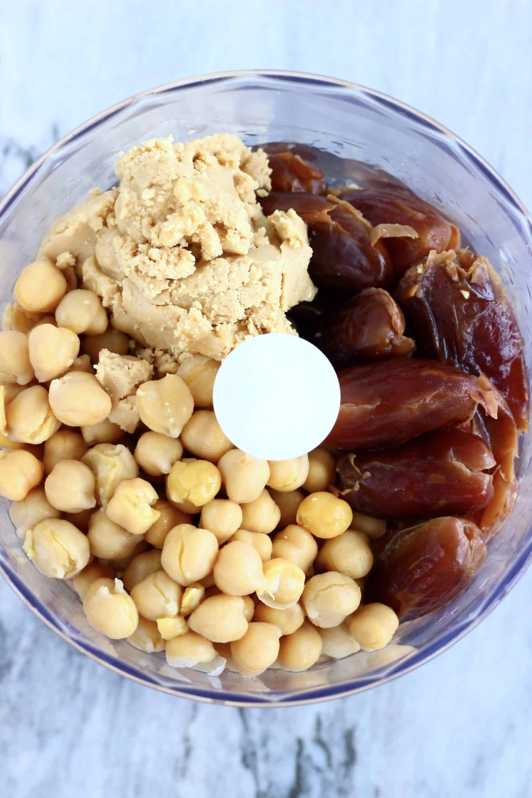 Chickpeas, dates, almond butter and almond milk in a food processor