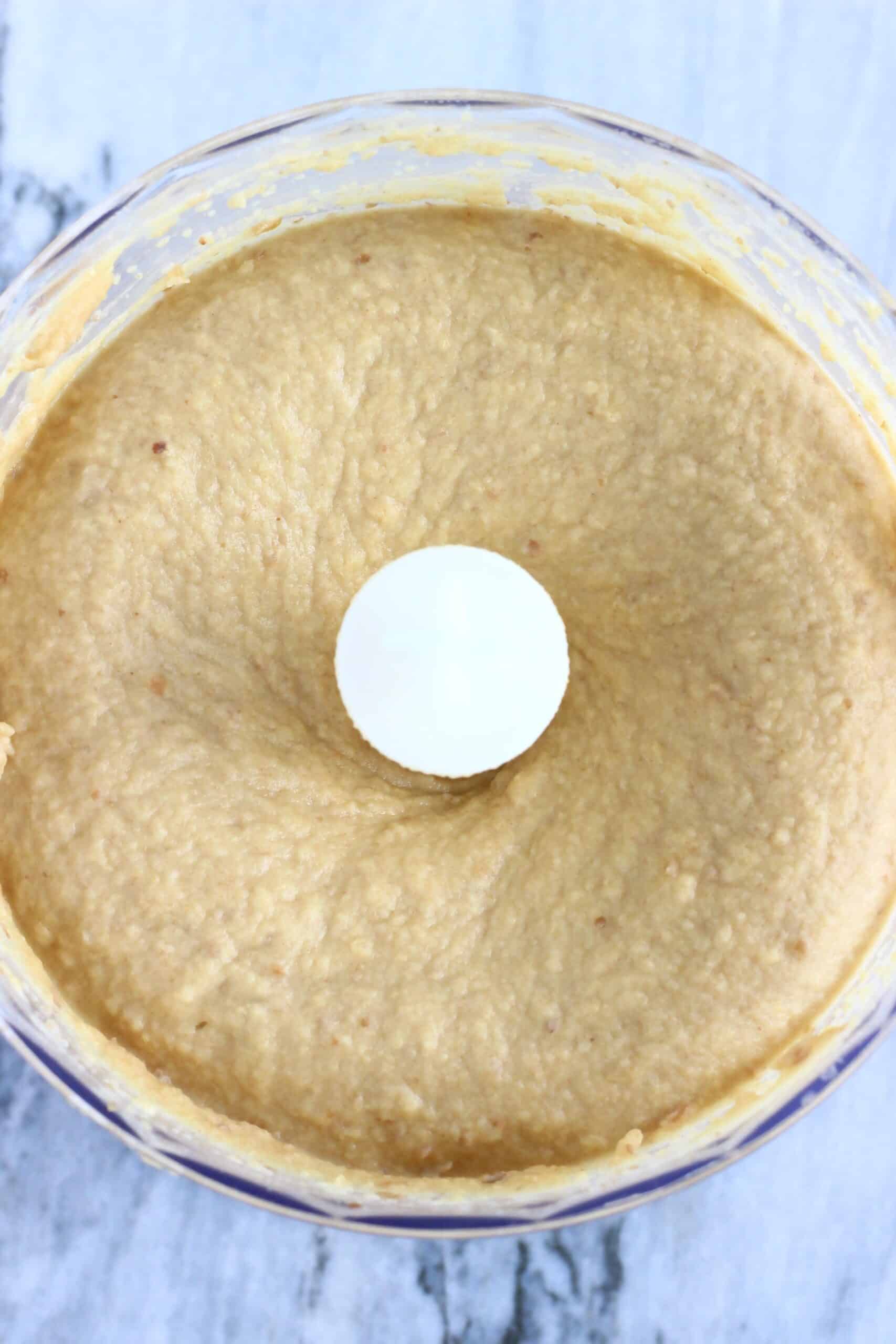 Blended chickpeas, dates and almond butter in a food processor