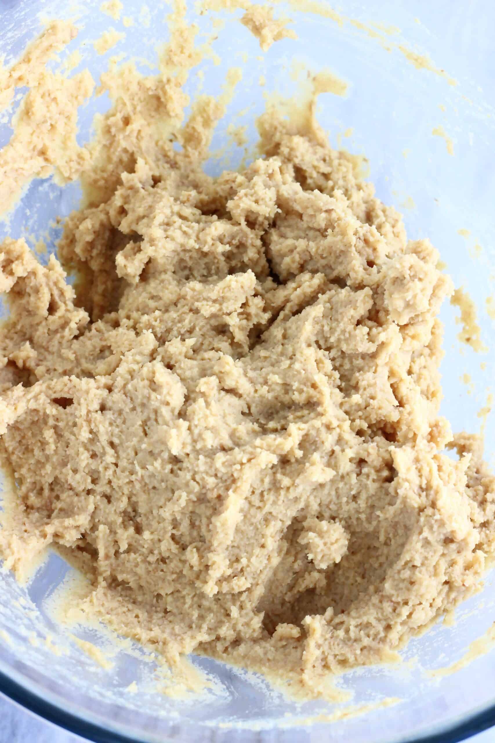 Raw chickpea blondies batter in a mixing bowl