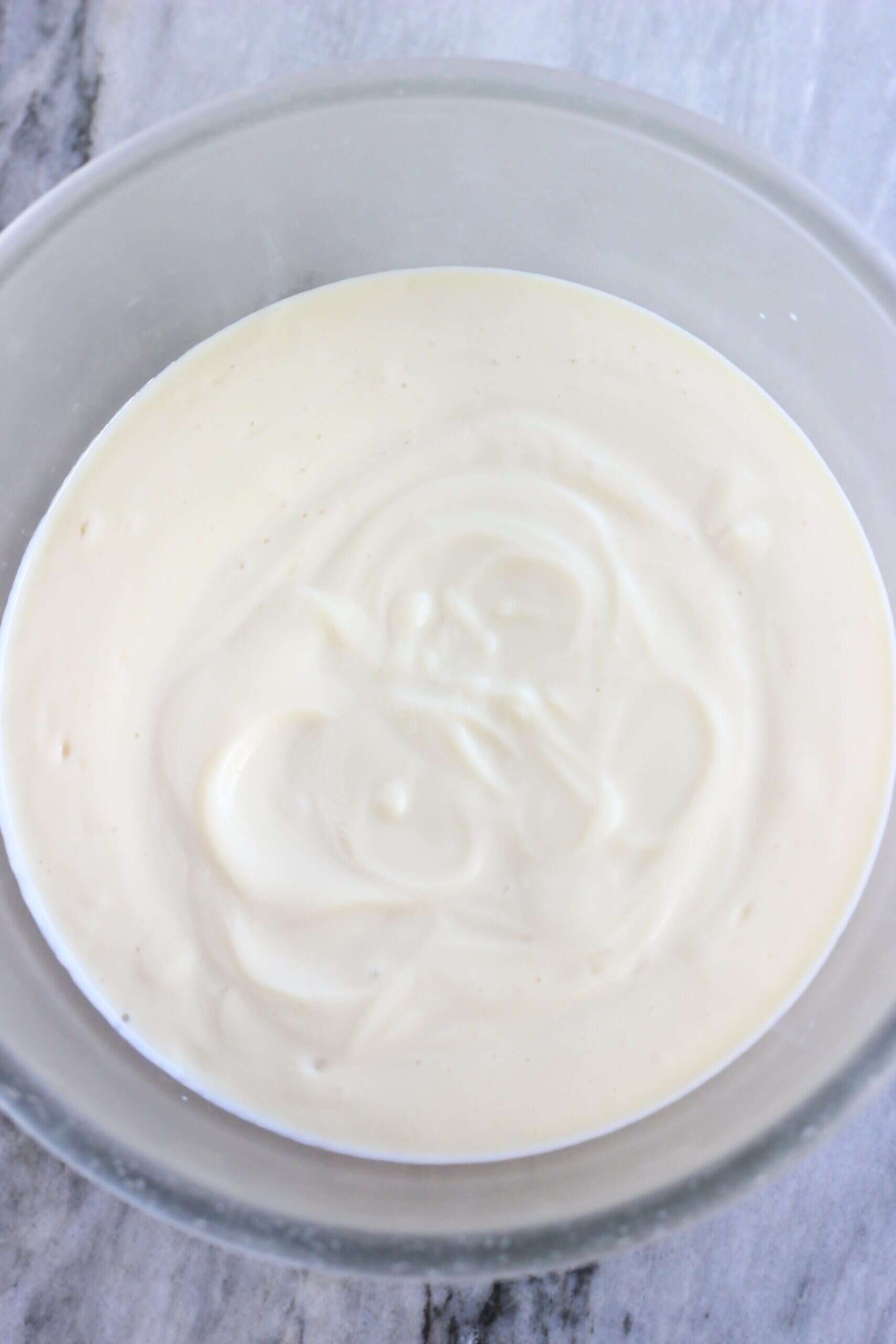 Vegan lemon coconut milk frosting in a bowl