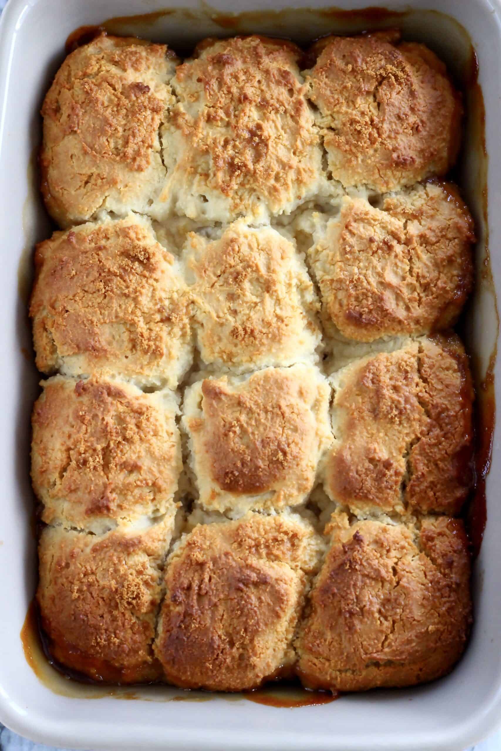 Baked gluten-free vegan apple cobbler in a baking dish