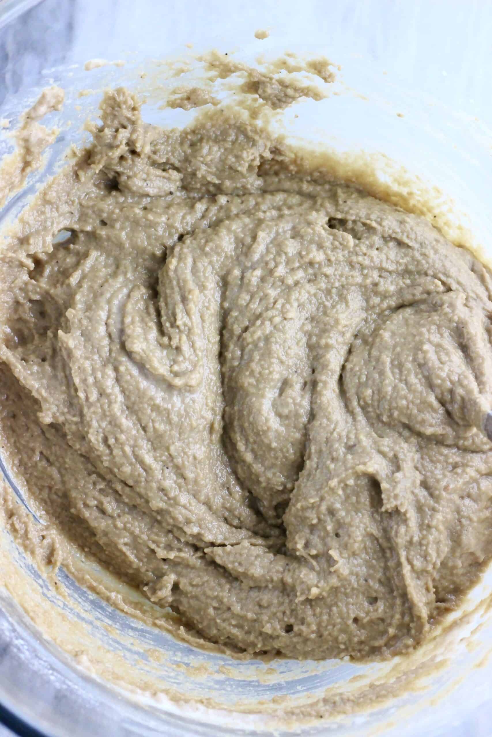 Raw vegan hojicha latte cake batter in a mixing bowl