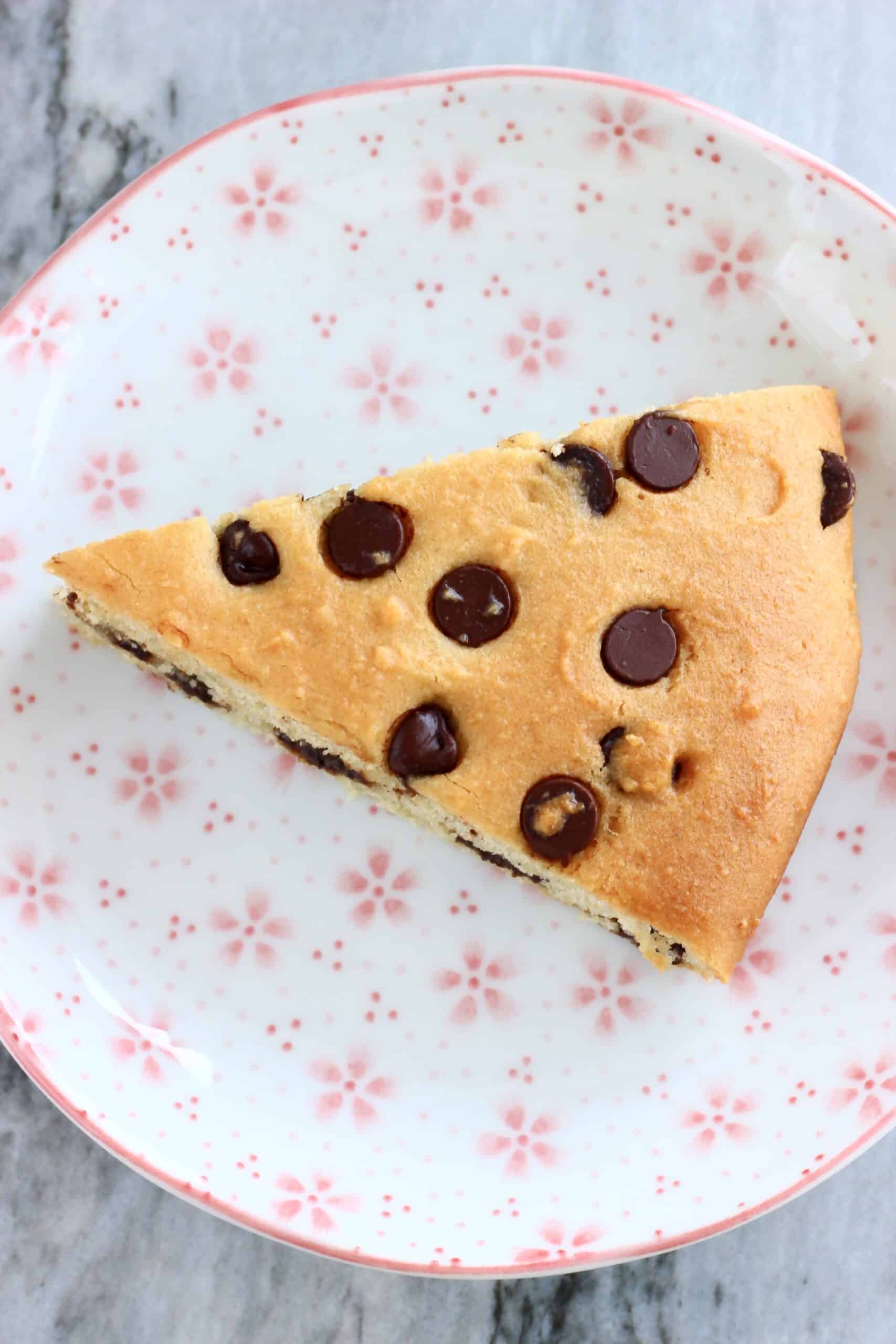 A gluten-free vegan chocolate chip scone on a plate