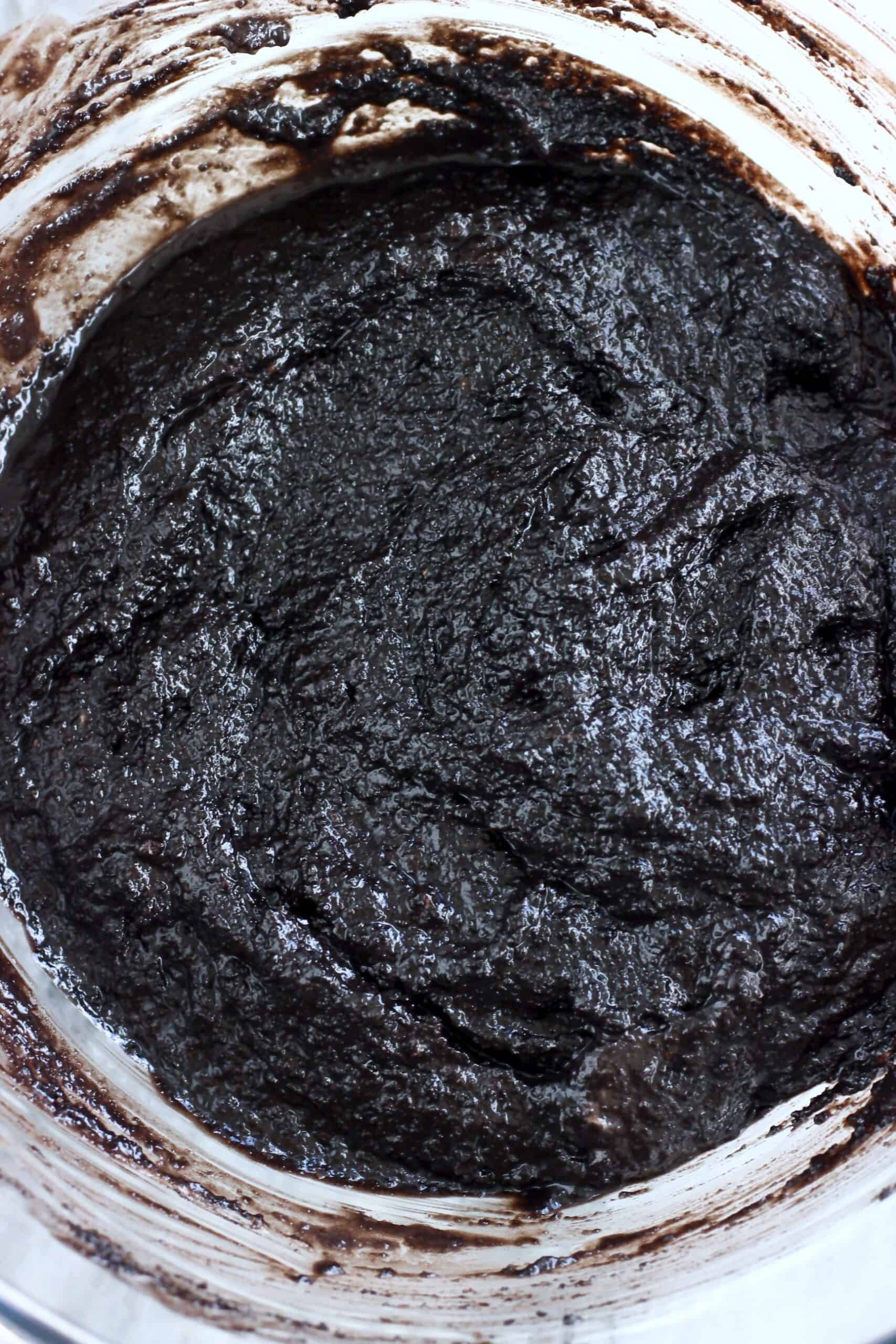 Raw vegan chocolate self-saucing pudding batter in a bowl