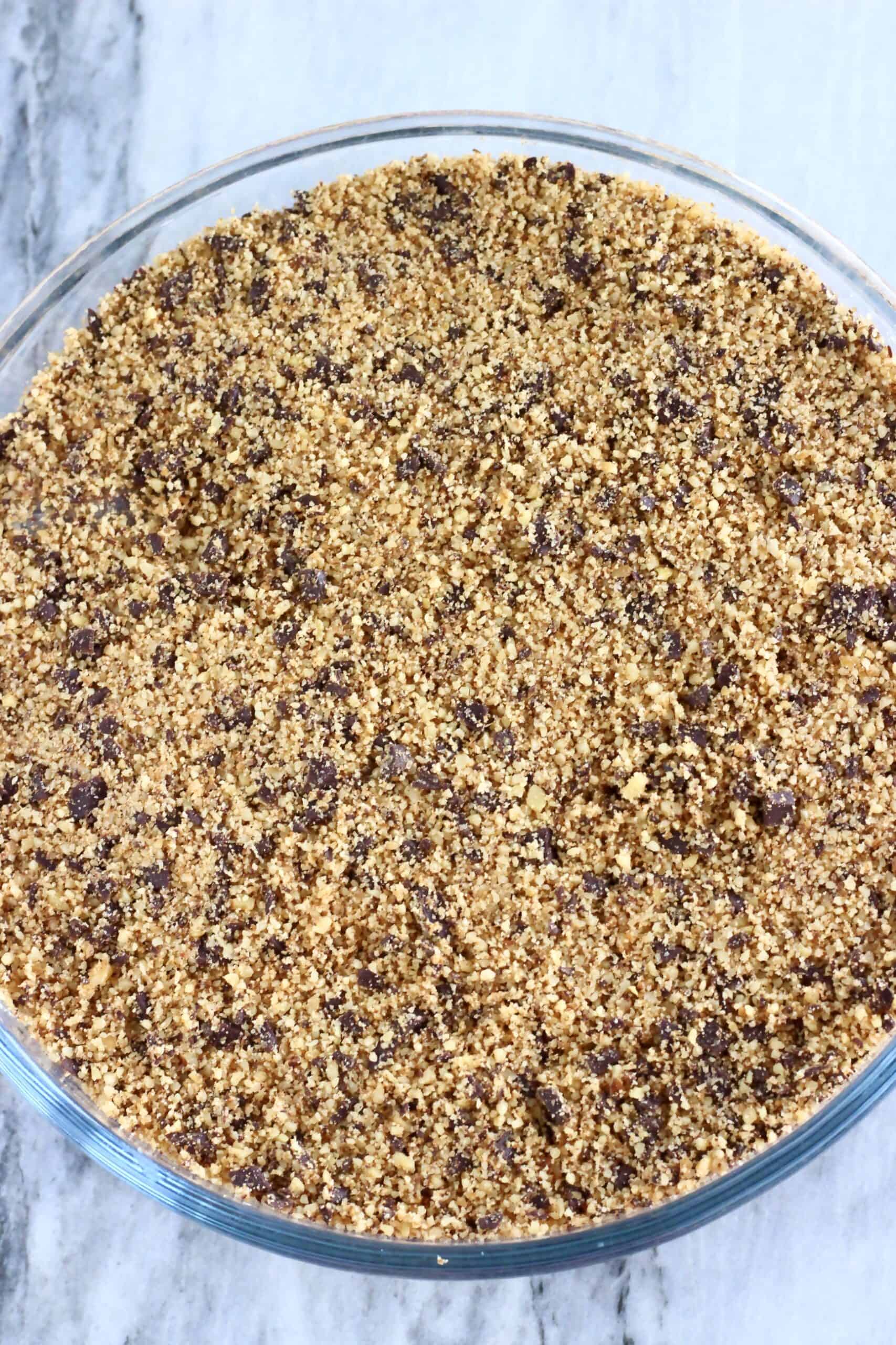 Raw gluten-free vegan chocolate baklava in a round baking dish