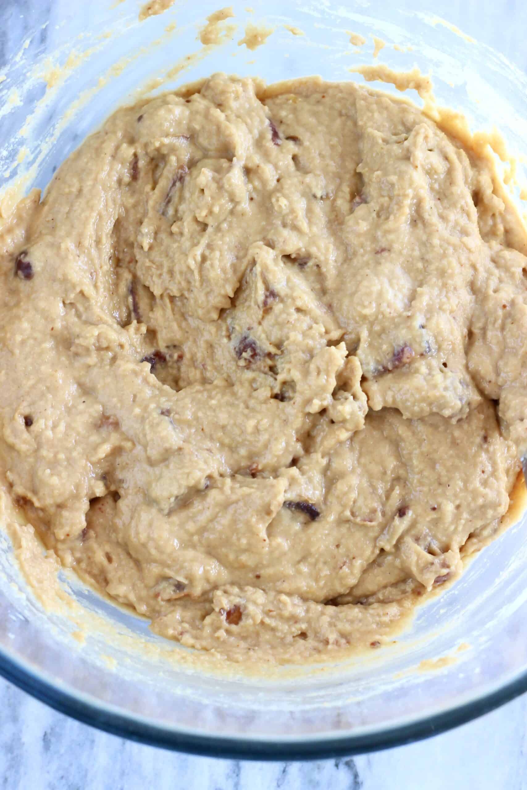 Raw vegan sticky toffee pudding batter in a bowl