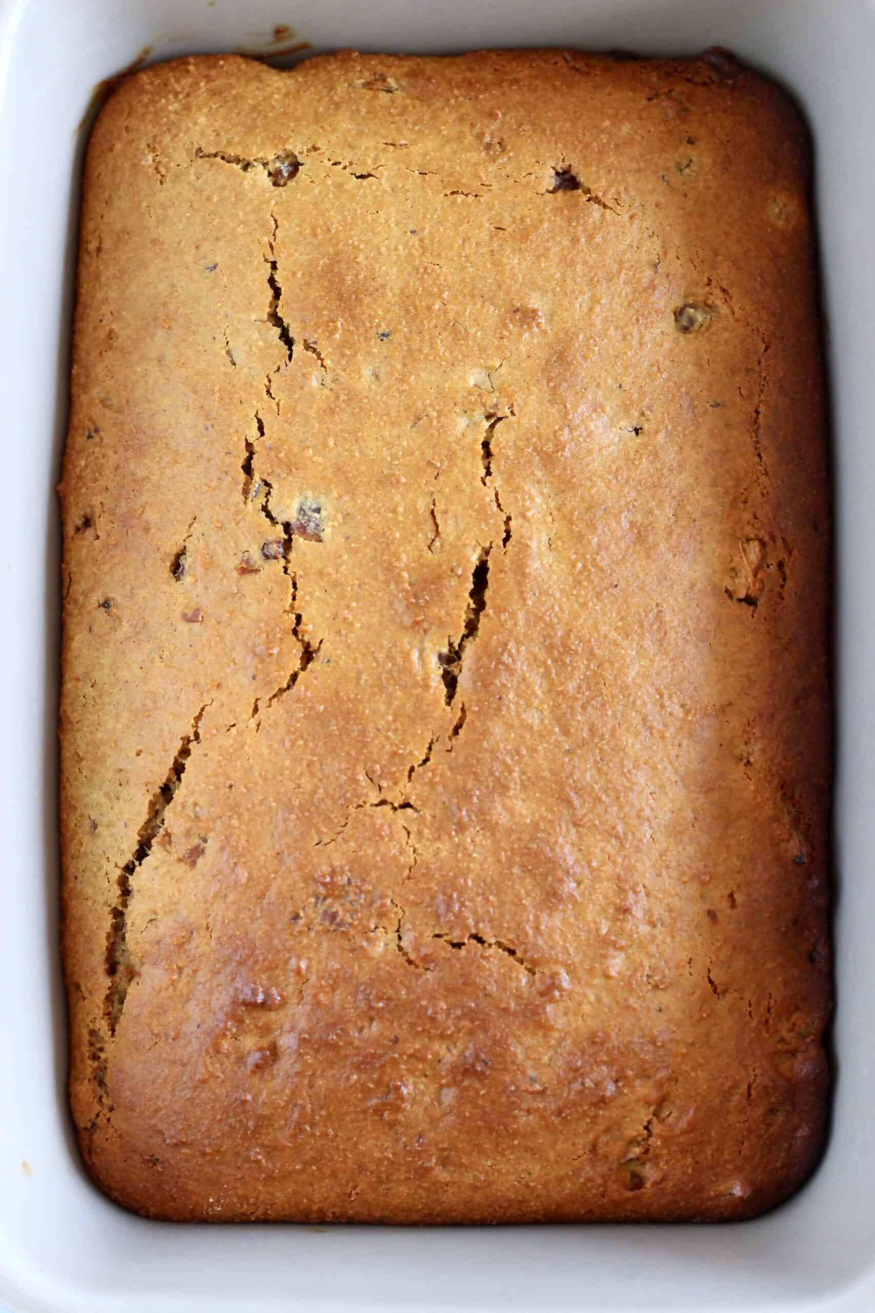 Baked vegan sticky toffee pudding in a rectangular baking dish