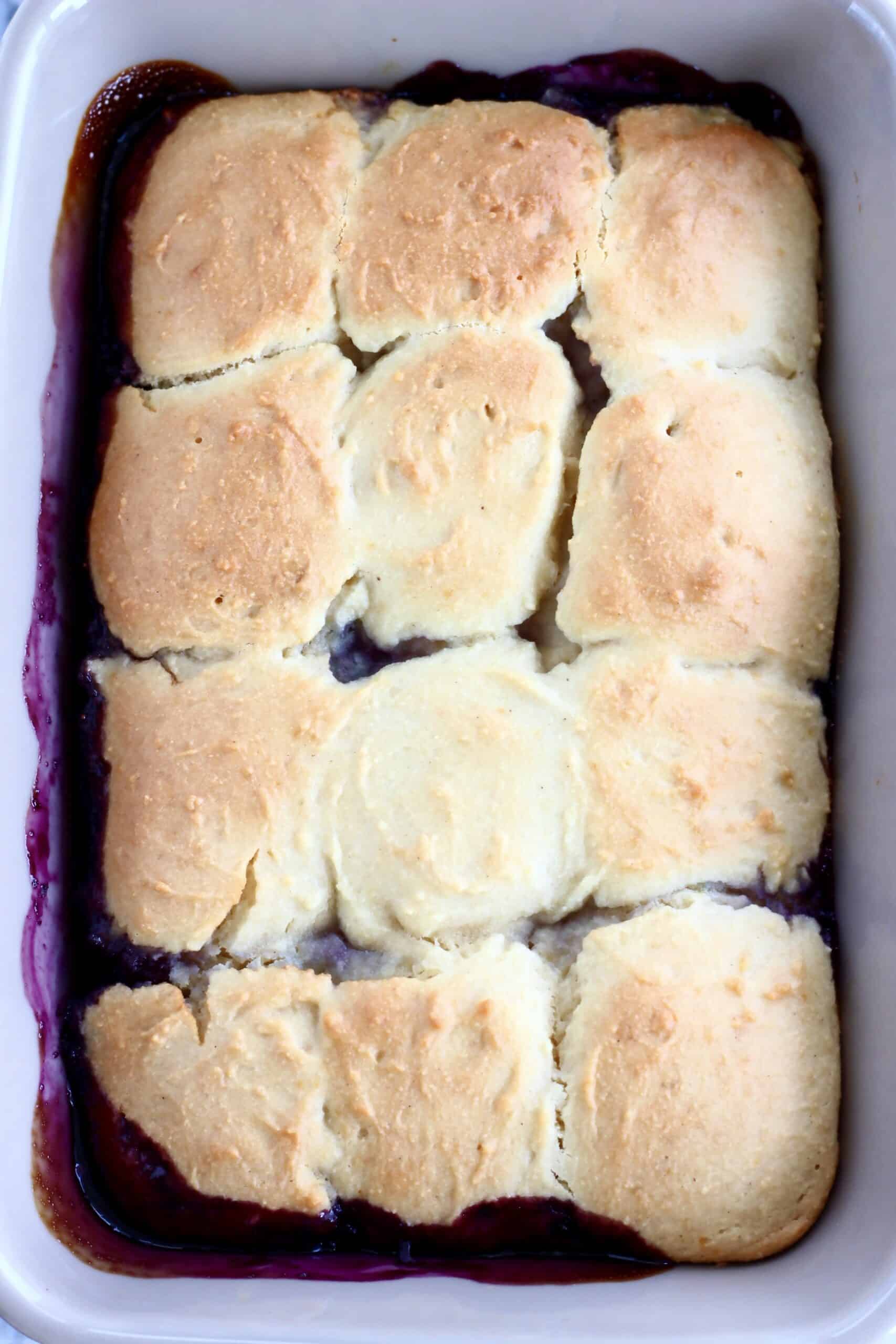 Baked Vegan Blueberry Cobbler in a rectangular baking dish